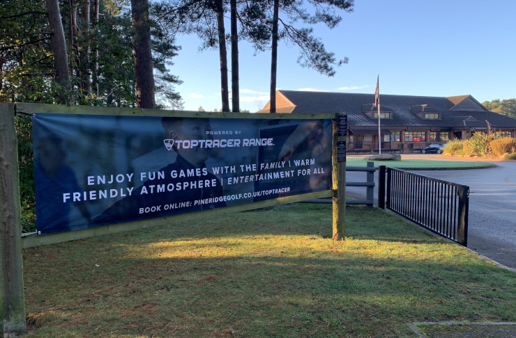 A vinyl banner displayed outside